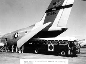 AMBUS Nestles Within the Petal Doors of the Giant C-141 (Starlifter)